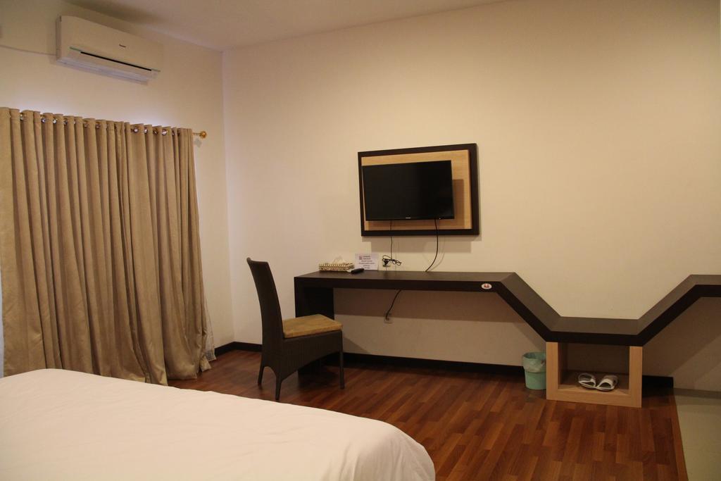 Kampoeng Nelayan Hotel Palu Habitación foto